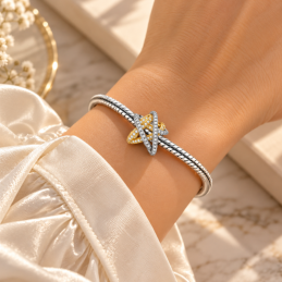 Charm étoile enlacé strass doré pour bracelet
