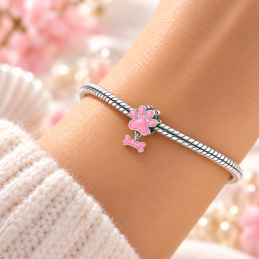 Charm phosphorescent patte chien os rose pour bracelet