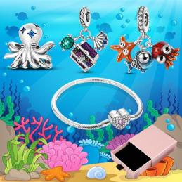 Bracelet avec trois charms coeur pieuvre coquillage coffre argent