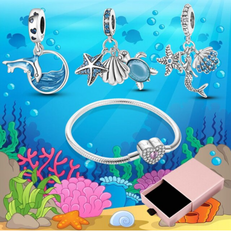 Bracelet avec trois charms coeur dauphin sirène tortue coquillage argent