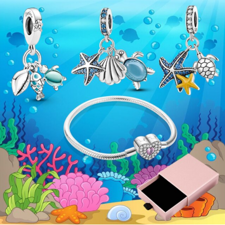 Bracelet avec trois charms coeur tortue étoile de mer coquillage argent