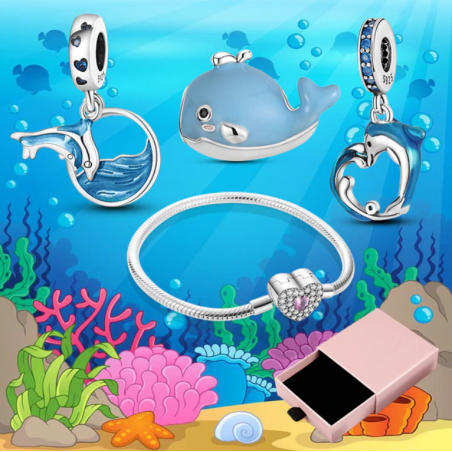 Bracelet avec trois charms coeur dauphin baleine argent