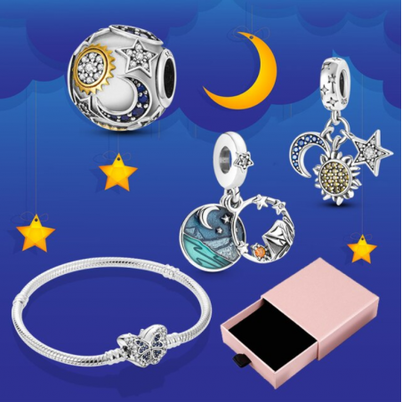 Bracelet avec trois charms papillon soleil lune étoile argent