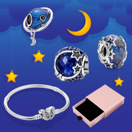 Bracelet avec trois charms papillon planète anneau étoile argent