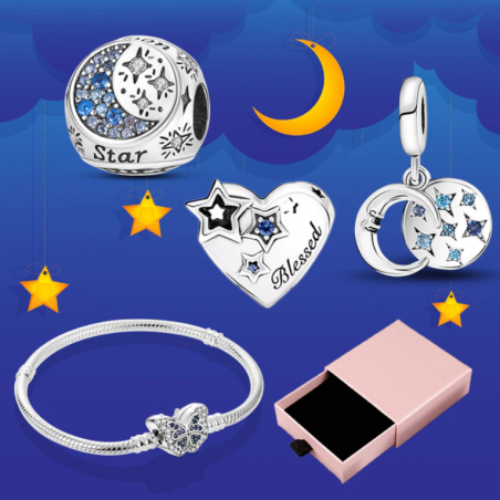 Bracelet avec trois charms papillon boule lune étoile coeur argent
