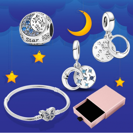 Bracelet avec trois charms papillon sphère lune étoile argent