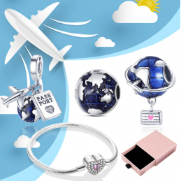 Bracelet avec trois charms coeur monde avion passeport argent